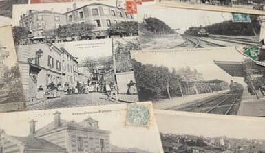 Plusieurs anciennes cartes postales de Cormeilles-en-Parisis posées sur une table